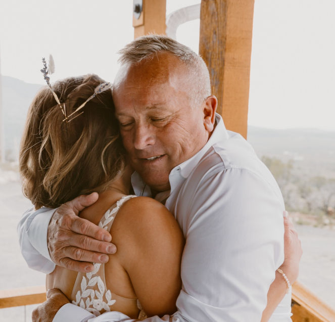 Steve Bearisto embracing his daughter Jenna